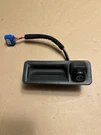 17-19 Kia Sportage Rear Camera With Gate Release Button. Fixed Price $34.95.